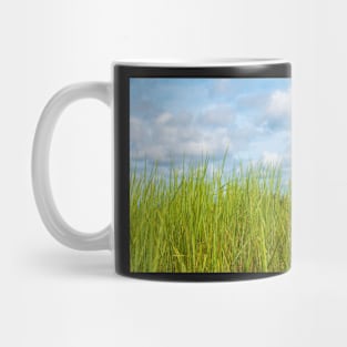 Grass and cloudy sky Mug